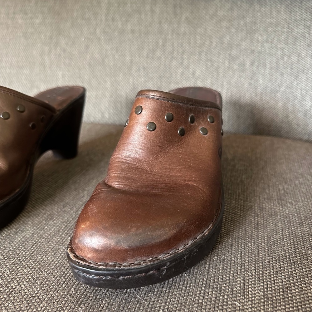 Born clog shoe in a copper brown with brown grommet like studs